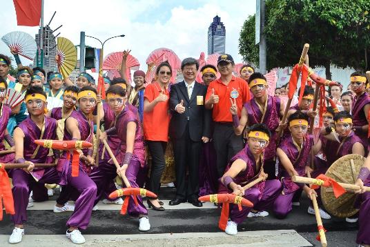 Minister of Education with student performers for National Day